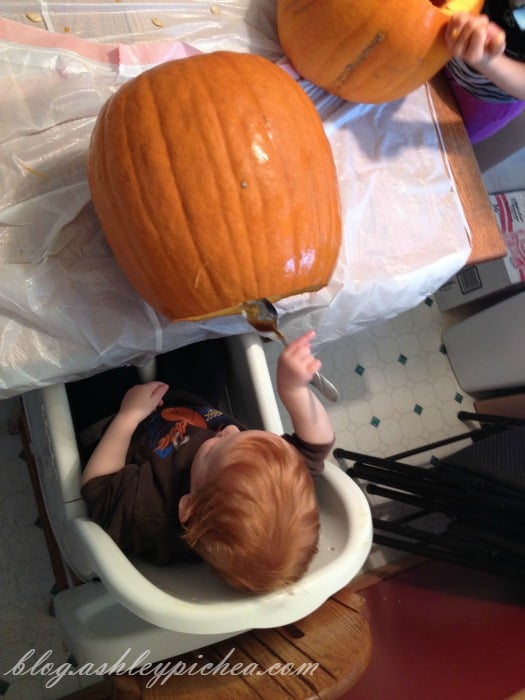 Pumpkin Carving with Kids - Chris using a spoon