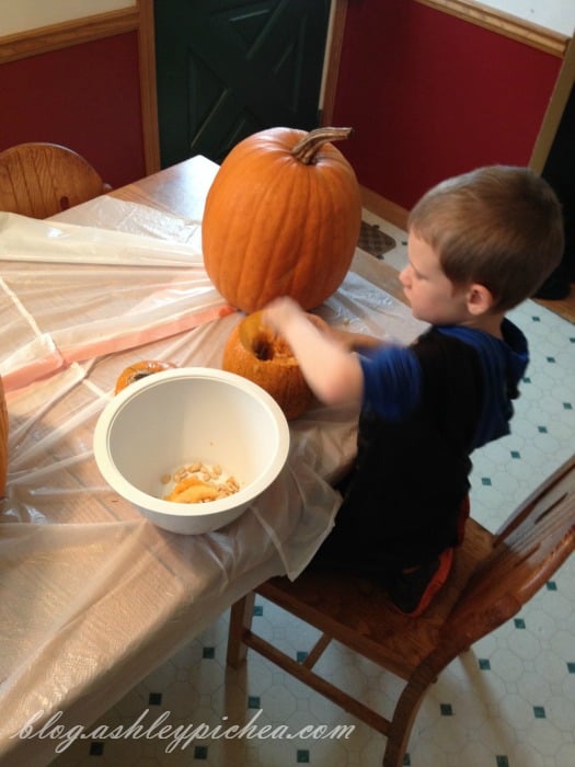 Pumpkin Carving with Kids - David gutting the pumpkin