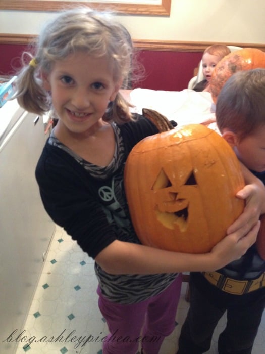 Pumpkin Carving with Kids - Jenny and her pumpkin