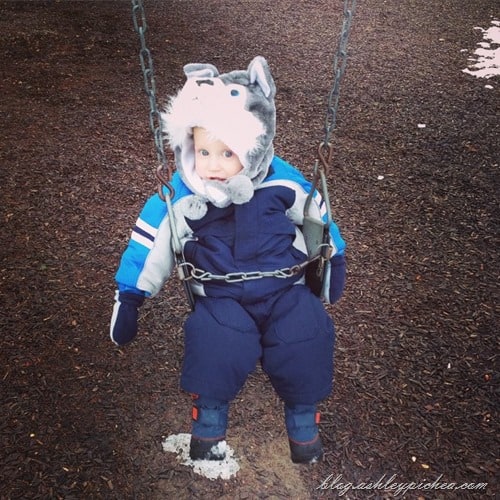 chris swinging at the park