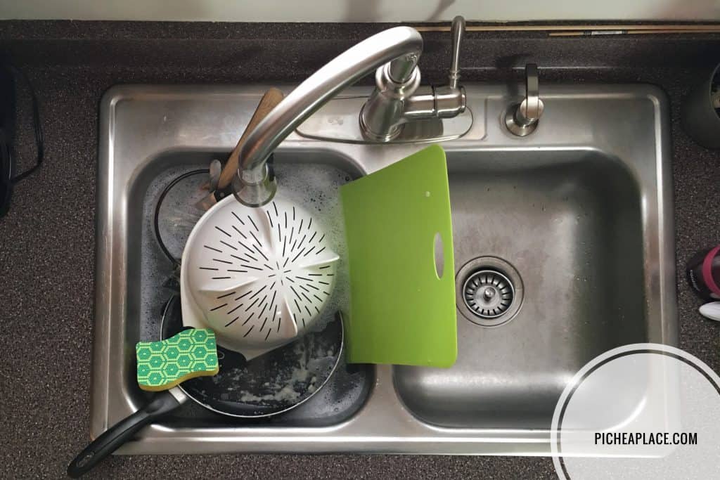 washing dishes with a Heavy Duty Scrub Dots sponge