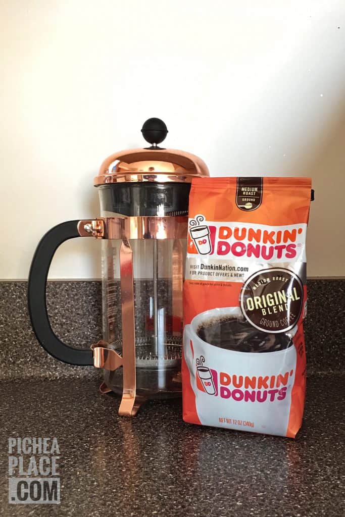 Double the grounds in your French Press to make espresso-strength coffee at home with Dunkin' Donuts coffee grounds.