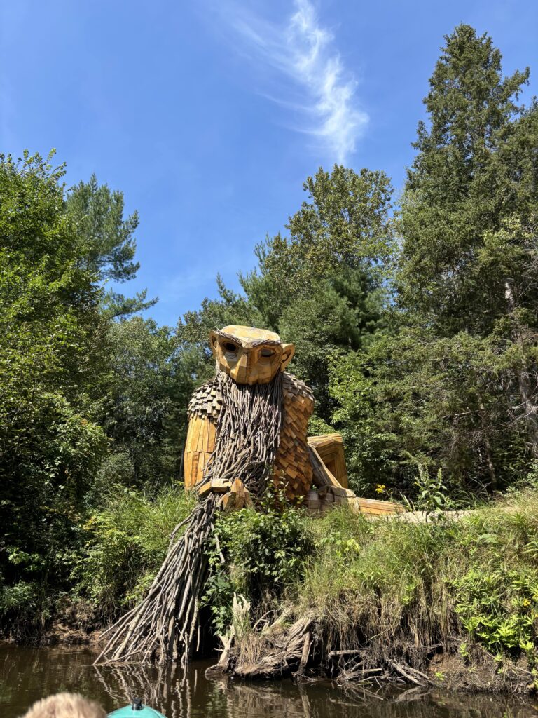 seeing Benny the Beard Fisher troll while paddling the Manistique River with Northland Outfitters