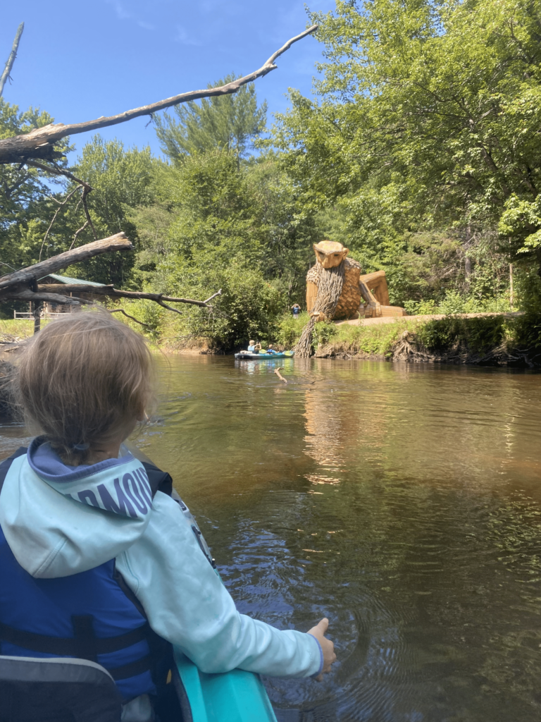 seeing Benny the Beard Fisher troll while paddling the Manistique River with Northland Outfitters